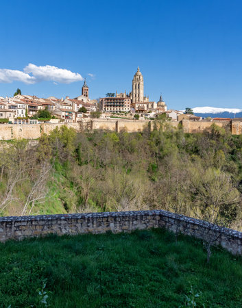 A far away view of Segovia's downtown from the front plaza of the Alcazar castle, providing a sweeping panorama of the historic Segovian city skyline and the distant downtownの写真素材