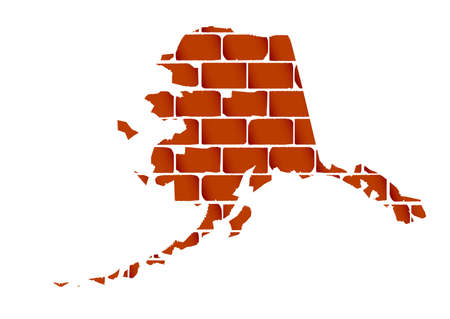 A section of brick wall as a background to the outline map of the state of Alaskaのイラスト素材