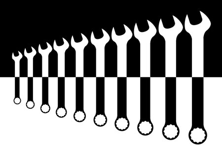 A collection of various sized mechanics spanners in black and white silhouetteのイラスト素材