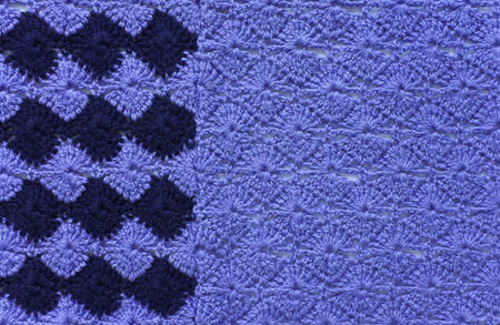 Knitted fabric with a pattern of blue and dark blue yarn  Crochet knitting の写真素材