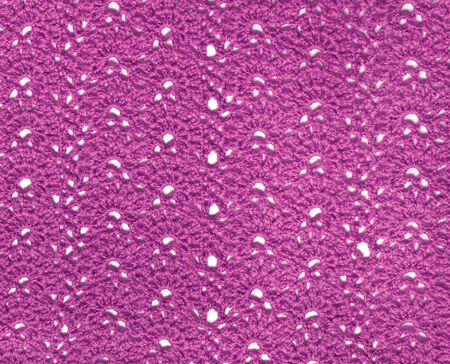 Openwork knitted fabric made of pink yarn  Crochet knitting の写真素材