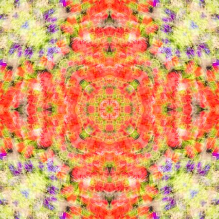 Abstract symmetrical ornamental pattern of red, yellow and purple. Seamless textureの写真素材