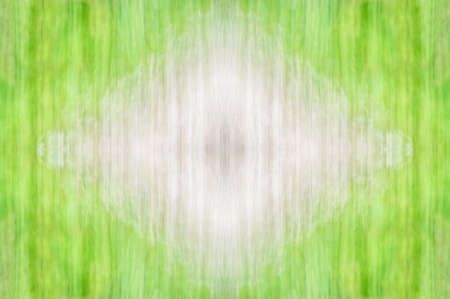 Abstract symmetrical ornamental pattern of beige and green with copy-space. Seamless textureの写真素材