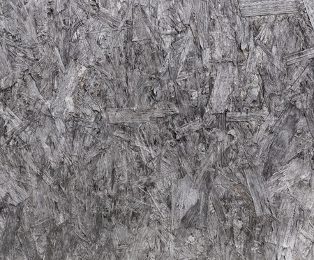 Background of old pressed wood shavings gray colorの写真素材