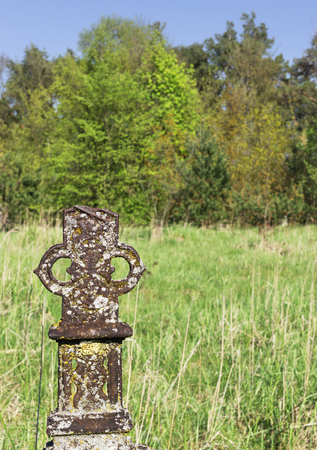 Metal abandoned tomb on old Christian cemeteryの写真素材