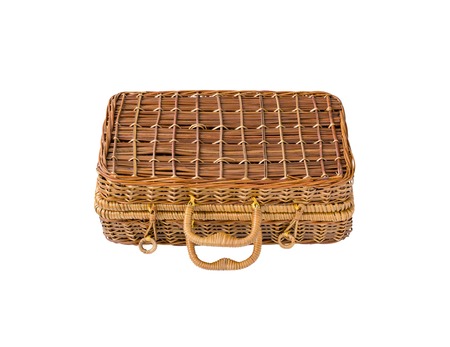 Wicker retro suitcase or trunk isolated on white backgroundの写真素材