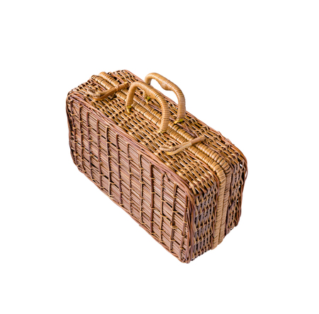 Wicker retro suitcase or trunk isolated on white backgroundの写真素材