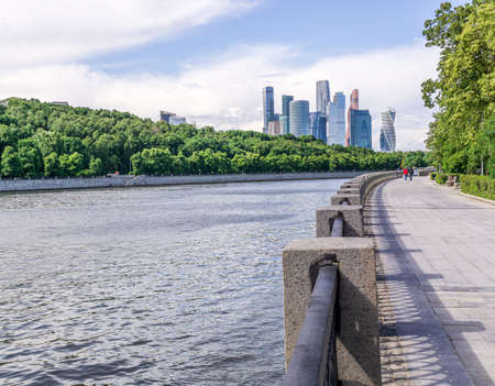 MOSCOW, RUSSIA - JUNE 23, 2017: Embankment along river opposite complex of buildings Moscow International Business Center "Moscow-City"のeditorial素材