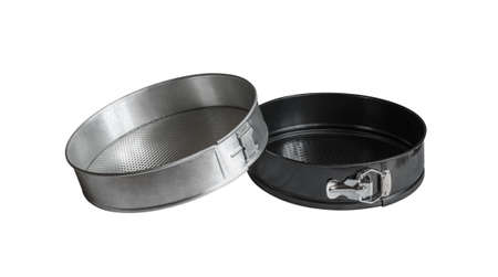 Two collapsible baking dishes for making cakes and pies. Isolated on white background