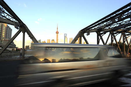 Long exposure photo of Shanghai bund Garden bridge roadの写真素材