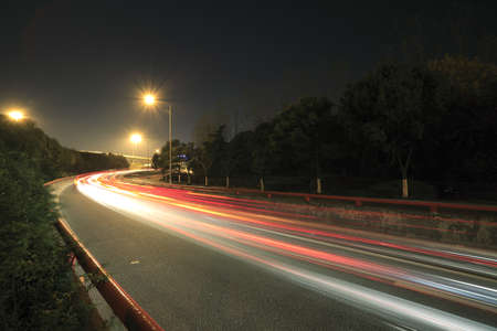 Long exposure photographs of urban night dusk highway traffic