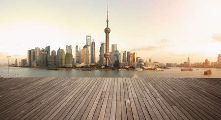 Shanghai's landmark skyline prospects of wood floor corridor at urban buildings landscape
の写真素材
