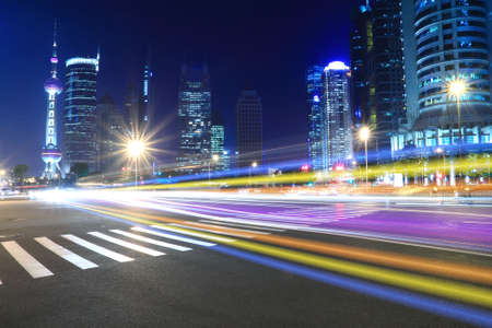 Night Light trace modern architecture  background  in Shanghai, Chinaの写真素材