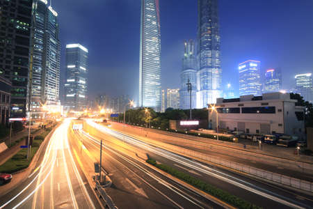 Background night view of Shanghai pudong lujiazui city landmark buildingsの写真素材