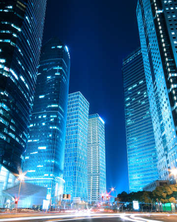 Dreamy blue of modern office buildings at night in Shanghai Far Eastの写真素材