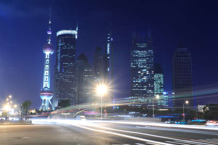 Night Light trace modern architecture  background  in 
Shanghai, Chinaの写真素材