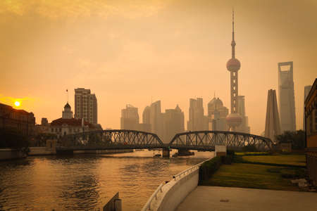 Shanghai Bund medieval garden bridge at sunrise skylineの写真素材