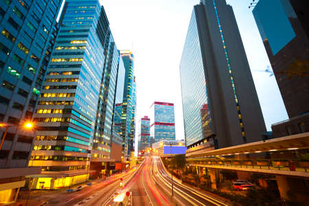 Hong Kong modern buildings backgrounds of city road light trails