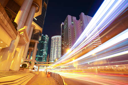 Hong Kong modern landmark buildings backgrounds of city road light trailsの写真素材