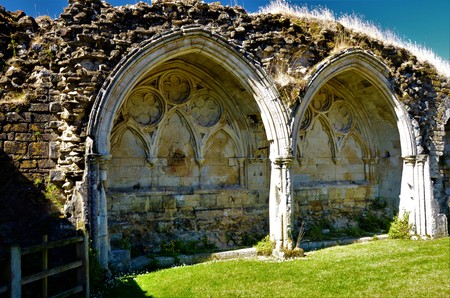 A view of the extensive ruins of the medieval Kirkham priory in North Yorkshireの写真素材