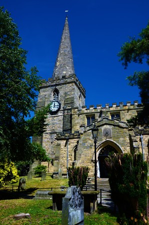 An exterior view of the church building and graveyard in Pickering, North Yorkshireの写真素材