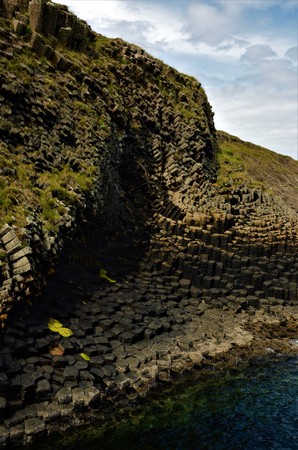 A view of the prehistoric volcanic geological rock formations on the Scottish Island of Staffa