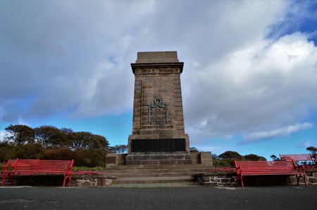 A view of a hilltop war memorial monument in the town of Arbroathのeditorial素材