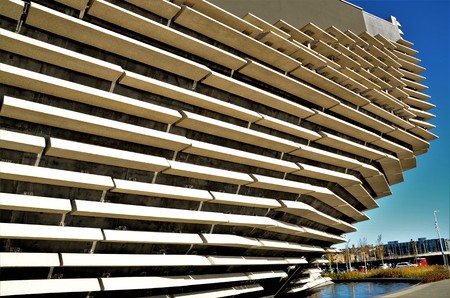 An exterior view of a new museum building on the shore of the river Tay in Dundee