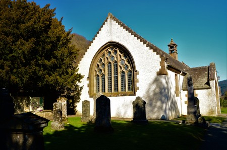 A view of the old church building and 5000 year old Yew tree at Fortingall in rural Perthshire.の写真素材