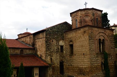 An exterior view of a large stone church building in the lakeside town of Ohrid in North Macedonia