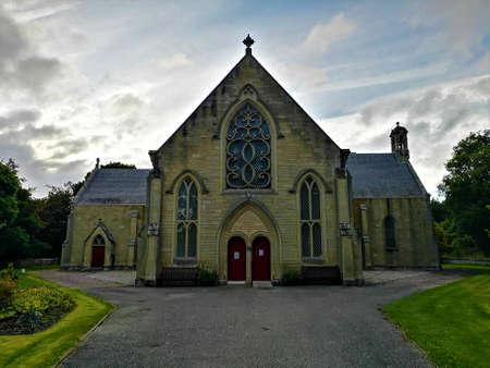 An exterior view of the old stone Church buildings in the Highlands town of Grantown on Spey in Scotlandの写真素材