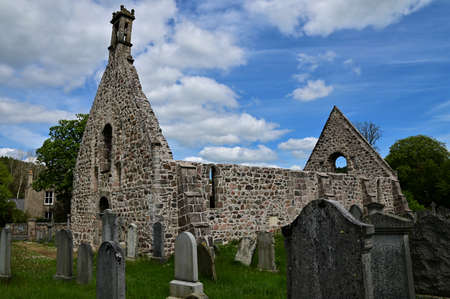 A view of the ruins of an old church building and graveyard in Kincardine OâNeil in Deeside.の写真素材