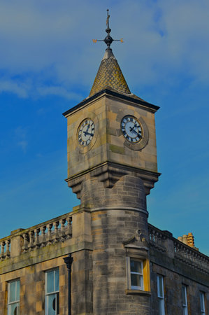 A view of a clock tower building in the Stockbridge area of Edinburgh.の写真素材