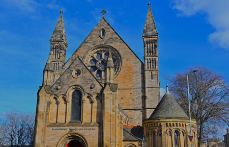 An exterior view of an old stone church building in the city of Edinburgh in Scotland.の写真素材