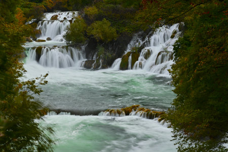 A view of the stunning waterfalls among the forest and limestone scenery in the Krka National Park...