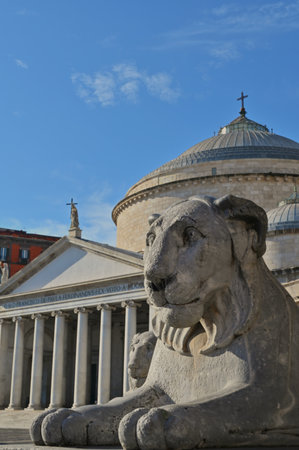 An exterior view of an impressive Basilica, lined with columns in the Italian city of Naples.の写真素材