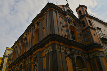 An exterior view of the faÃ§ade of a religious church cathedral building in the Italian city of Naples.の写真素材