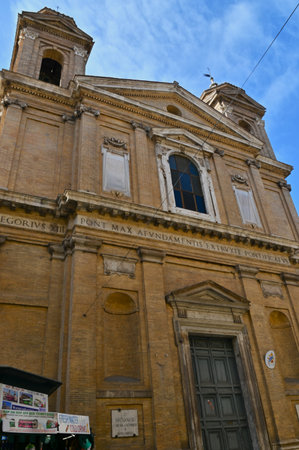 An exterior view of the architectural detail of a religious church building in the city or Rome in Italyの写真素材