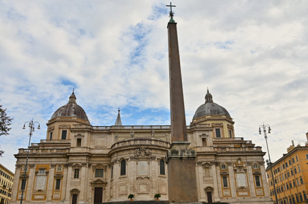 An exterior view of the architectural detail of a religious church building in the city or Rome in Italyの写真素材