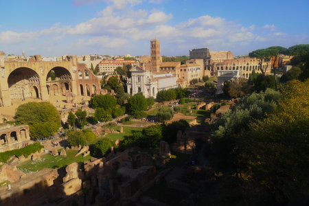A view of the historic Roman ruins of structures and buildings in the city of Rome in Italy.の写真素材