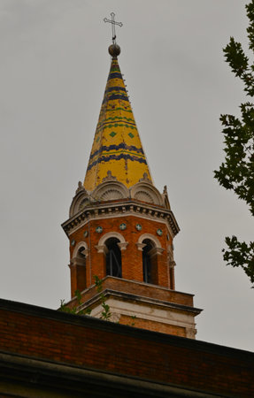 An exterior view of the architectural detail of a religious church building in the city or Rome in Italyの写真素材