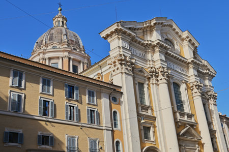 An exterior view of the architectural detail of a religious church building in the city or Rome in Italyの写真素材