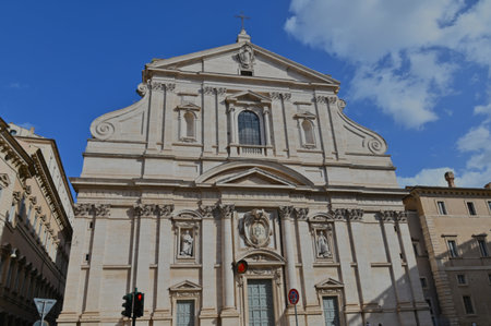 An exterior view of the architectural detail of a religious church building in the city or Rome in Italyの写真素材