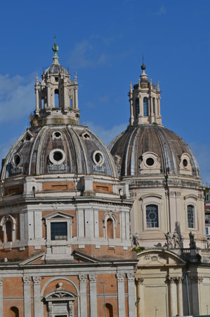 An exterior view of the architectural detail of a religious church building in the city or Rome in Italyの写真素材