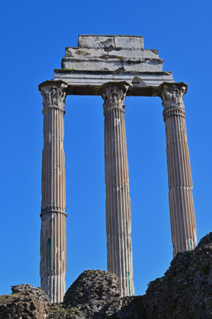 A view of the historic Roman ruins of structures and buildings in the city of Rome in Italy.の写真素材