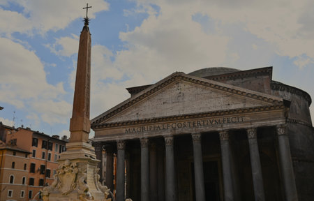 An exterior view of the architectural detail of a religious church building in the city of Rome in Italyの写真素材