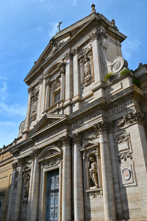 An exterior view of the architectural detail of a religious church building in the city or Rome in Italyの写真素材