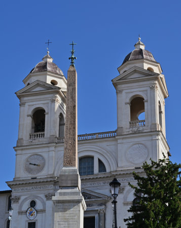 An exterior view of the architectural detail of a religious church building in the city or Rome in Italyの写真素材