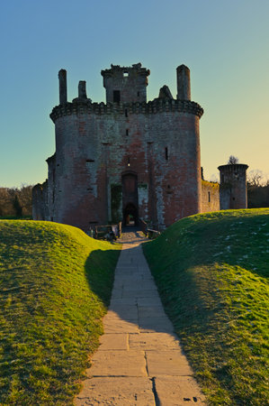 A view of the architecture of the old historic ruins of Caerlaverock castle in the Dumfries area of Scotland.の写真素材