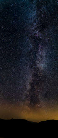 The Milky way over the fells of Tarn Hows in the english lake district